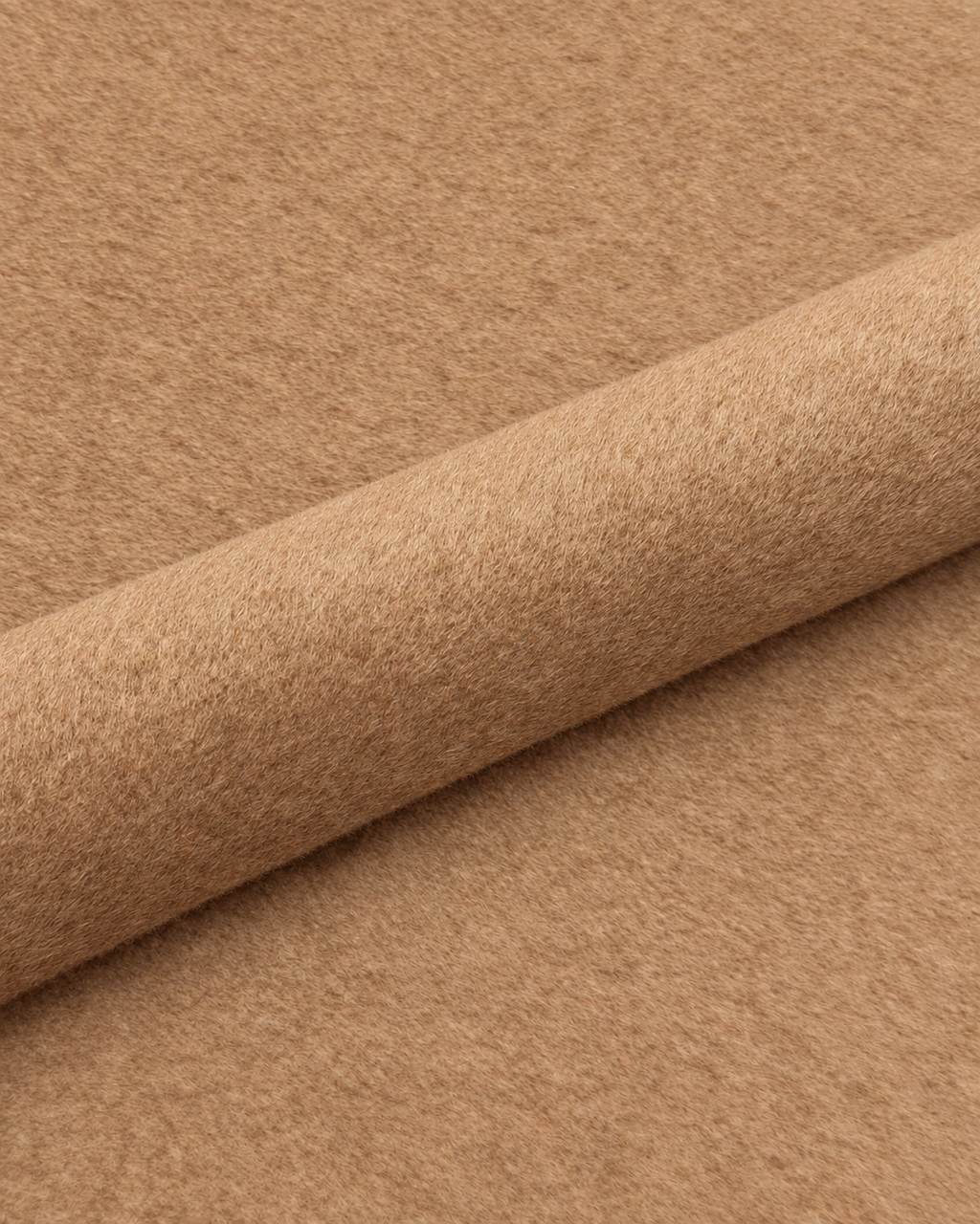 Desert gold wool fabric detail with a diagonal fold; colour-adjusted image.