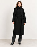26184 wool coat in Black, model styling with a high wrap collar and matching belt. AI-assisted image based on the supplied garment photographs.
