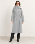 26184 wool coat in Light Grey, model styling with a high wrap collar and matching belt. AI-assisted image based on the supplied garment photographs.