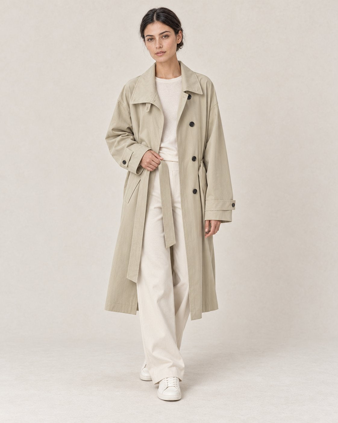 AI-assisted casual styling of THE LANE 9855 Coffee Green trench coat, with ivory straight-leg trousers and minimal low-top trainers.