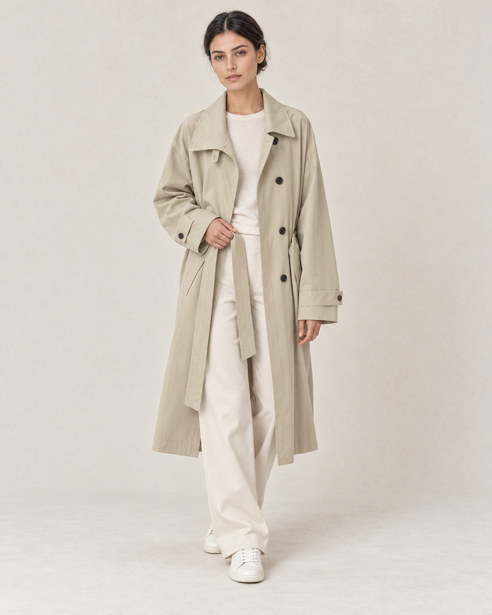 AI-assisted casual styling of THE LANE 9855 Coffee Green trench coat, with ivory straight-leg trousers and minimal low-top trainers.