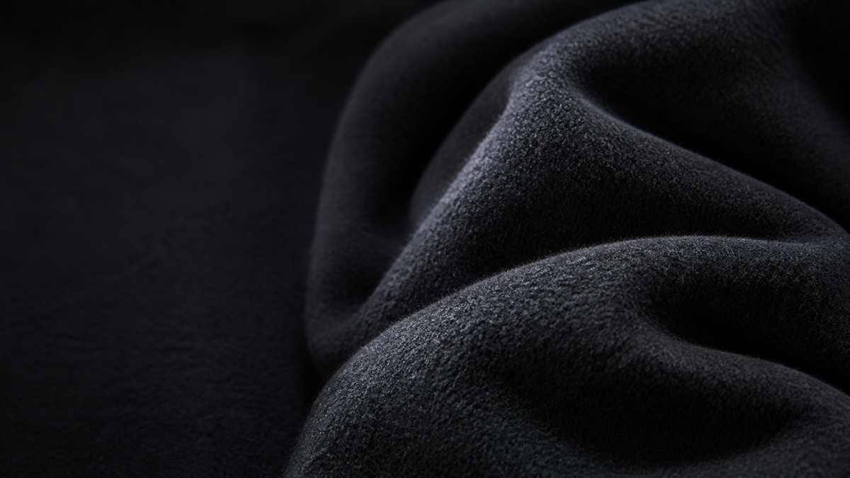 Deep charcoal double-faced wool fabric with sculptural folds