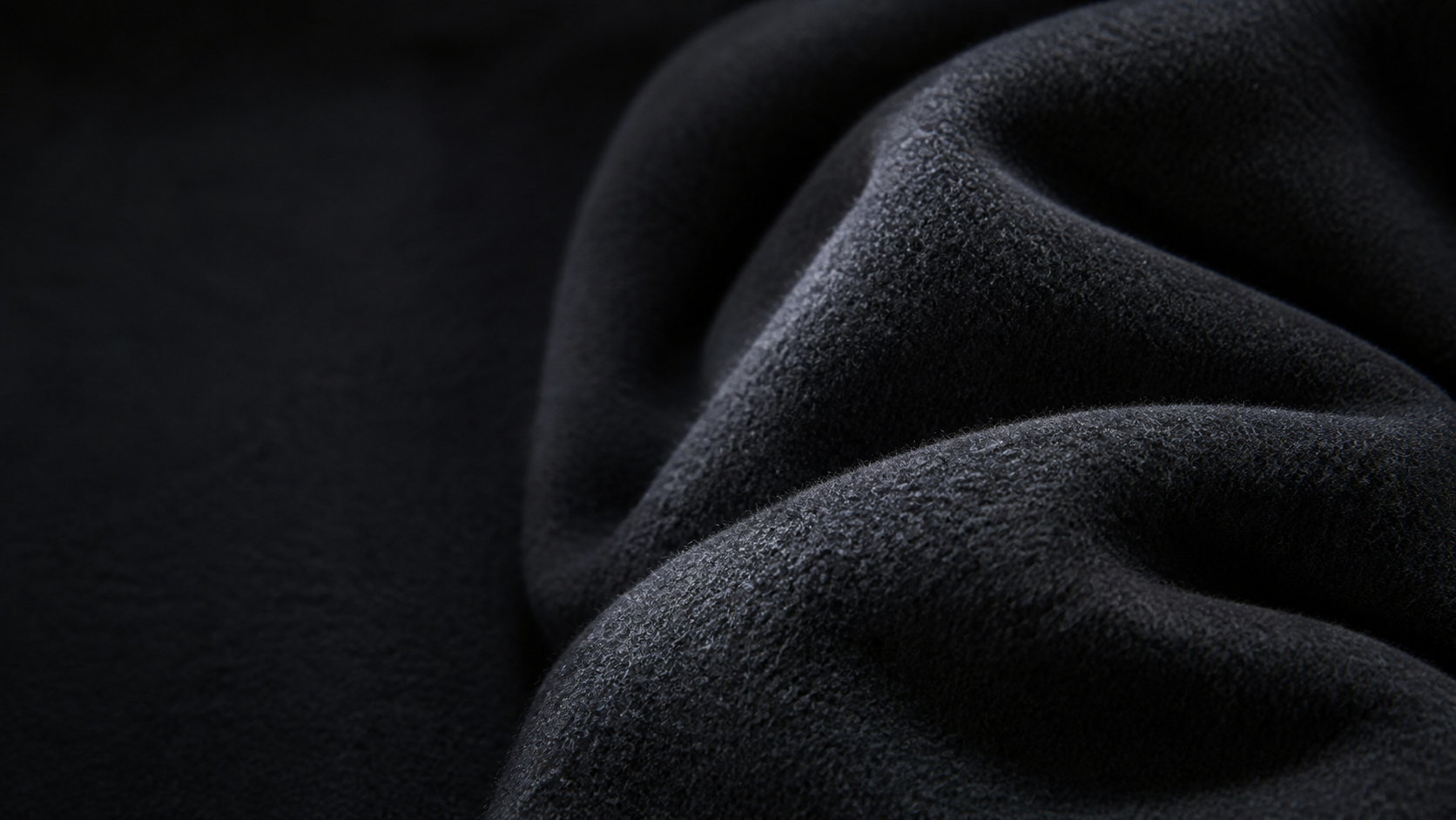 Deep charcoal double-faced wool fabric with sculptural folds