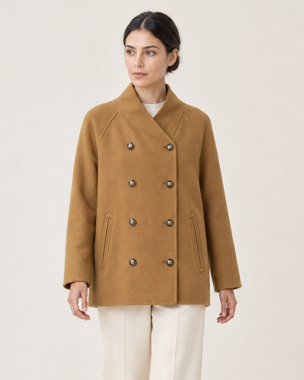 AI-assisted upper-body styling crop of THE LANE 25219 Brown straight-cut coat, with all eight existing buttons fastened.