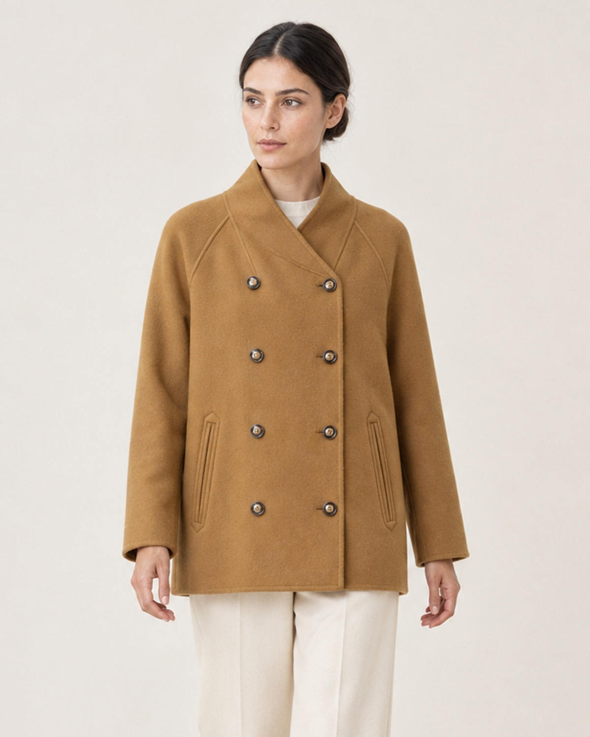 AI-assisted upper-body styling crop of THE LANE 25219 Brown straight-cut coat, with all eight existing buttons fastened.