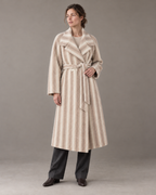 Striped Brown Heritage coat with open lapels and matching belt, worn with charcoal trousers and dark leather boots. AI-assisted styling based on supplied garment and fabric photographs.