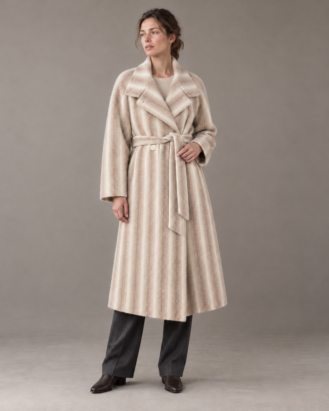 Striped Brown Heritage coat with open lapels and matching belt, worn with charcoal trousers and dark leather boots. AI-assisted styling based on supplied garment and fabric photographs.