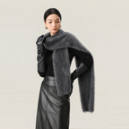 Grey cashmere and wool-blend scarf styled around the shoulders