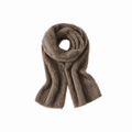 Brown brushed scarf coiled on a white background
