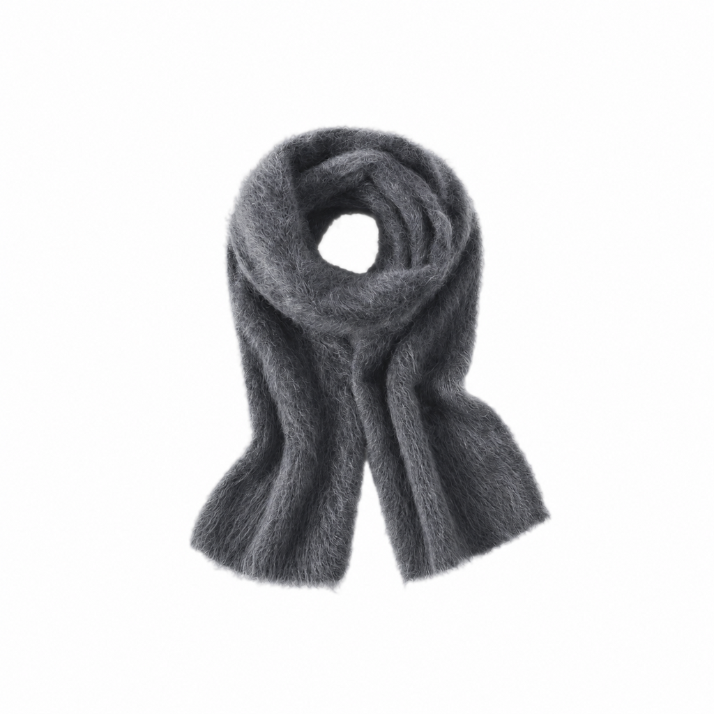 Grey brushed scarf coiled on a white background