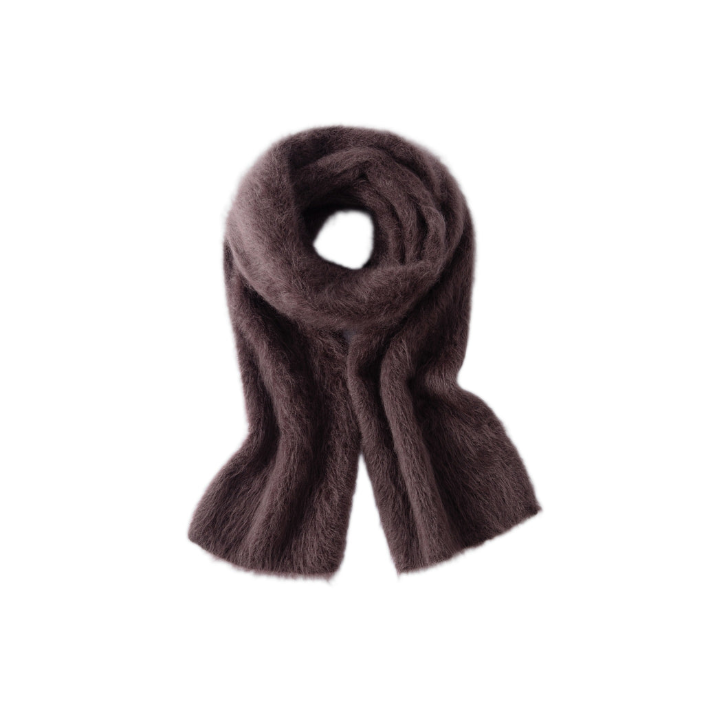 Purple brushed scarf coiled on a white background