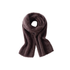 Purple brushed scarf coiled on a white background