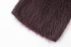 Close-up of the purple scarf showing its brushed surface and finished edge